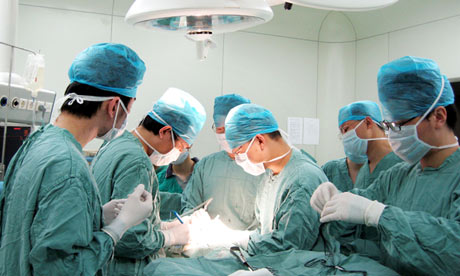 Doctors perform a kidney transplant operation at the Second Xiangya hospital in Changsha city