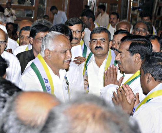 Karnataka Janata Paksha State committee members and office-bearers greeting the party president B.S. Yeddyurappa at a meeting in Bangalore on Thursday. 