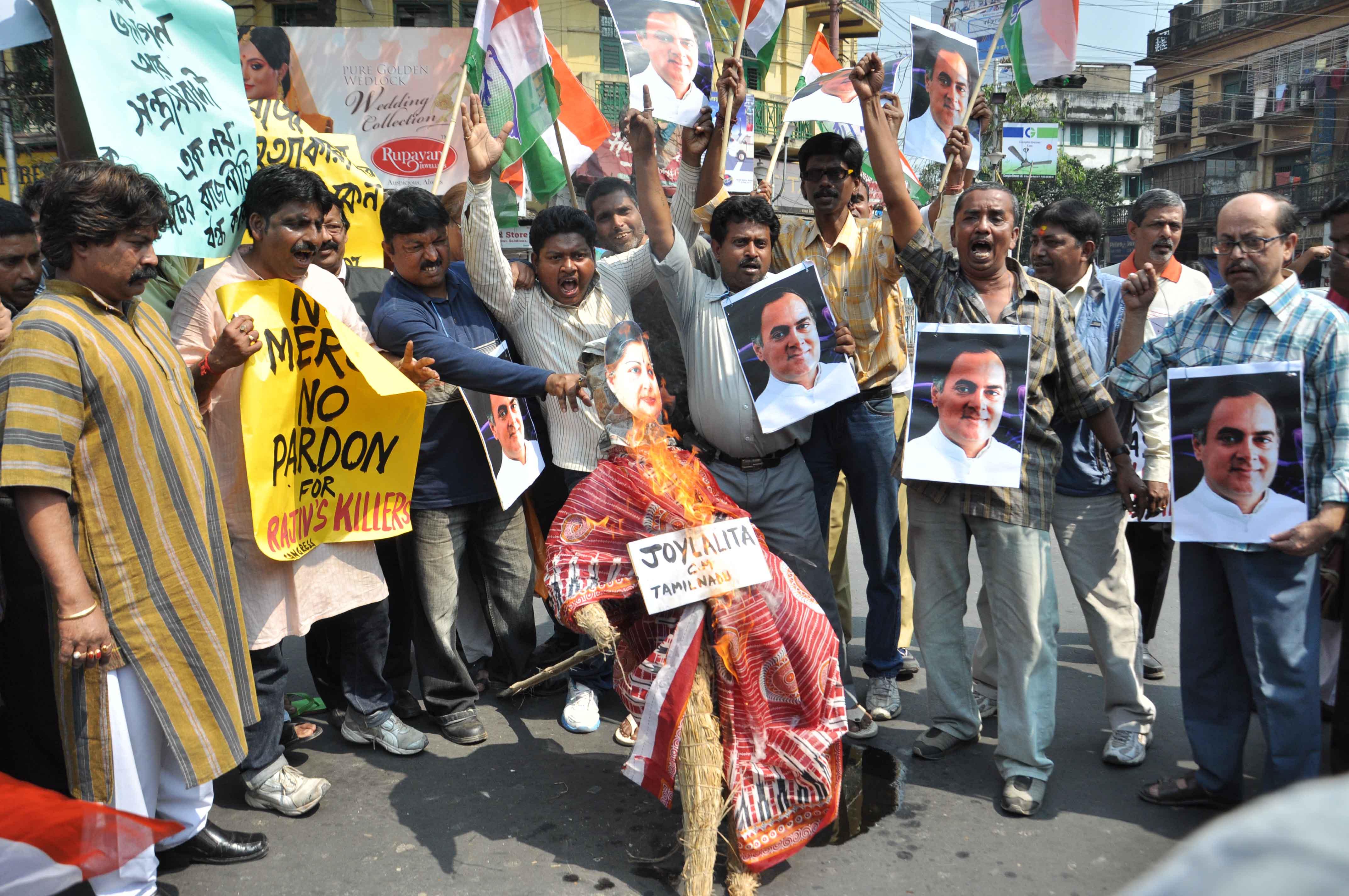 Youth Congress activists take part in a protest rally against Tamil Nadu chief minister Jayalalithaa`s decision to release the assassin`s of former Prime Minister Rajiv Gandhi in Kolkata on Feb. 22, 2014. (Photo: IANS)