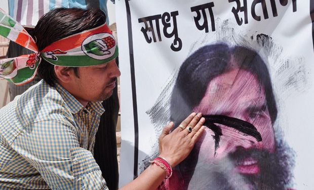 baba ramdev face blackened