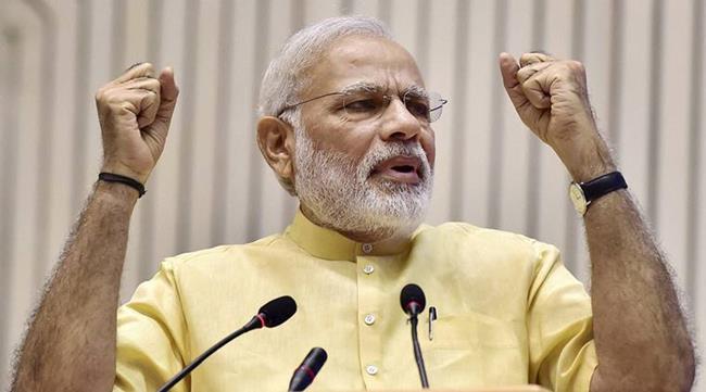 New Delhi: Prime Minister Narendra Modi gestures as he speaks at a function where he was felicitated by All India Gems and Jewellery Trade Federation (GJF) in New Delhi on Saturday. PTI Photo by Kamal Kishore (PTI7_23_2016_000207A)