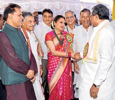Chief Minister Siddaramaiah greets Veteran Actress Jaya Prada at the inaugural of the renovated 'Sri Krishnadevaraya Kalamandira' at Vayalikaval in Bengaluru on Saturday. MP T Subbarami Reddy, writer Yarlagadda Lakshmi Prasad, MLA C N  Ashwath Narayan and Telugu Vignana Samithi President A Radhakrishna Raju are seen. -Photo/ M S MANJUNATH